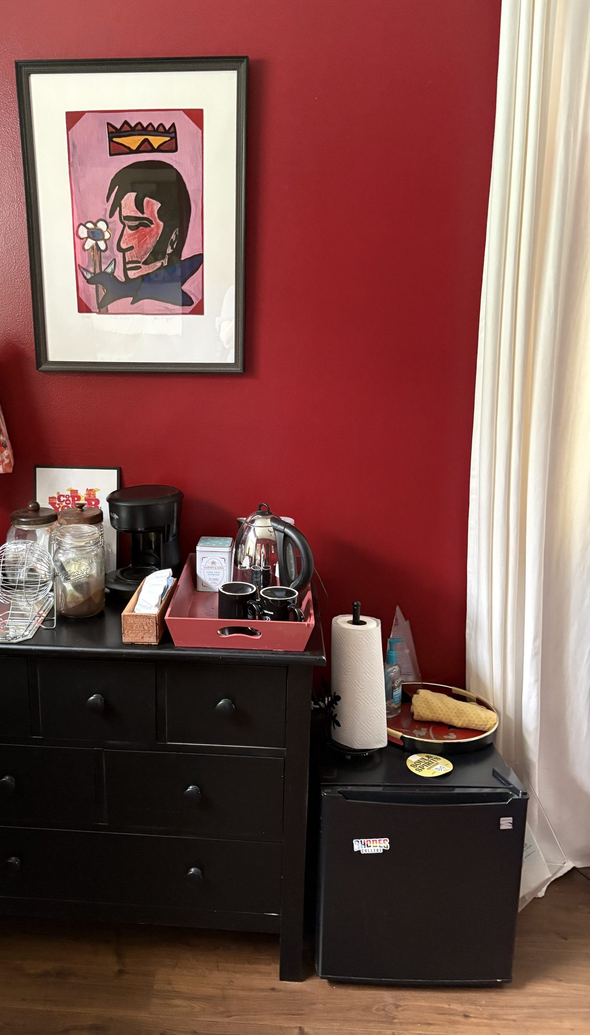Coffee and tea station with a mini fridge inside the Naturally Memphis home